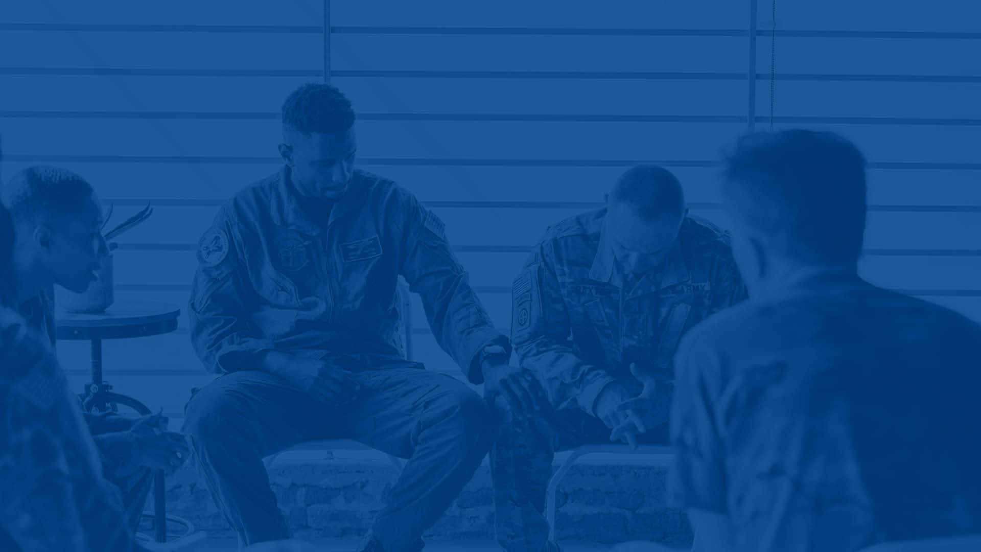 Military men praying